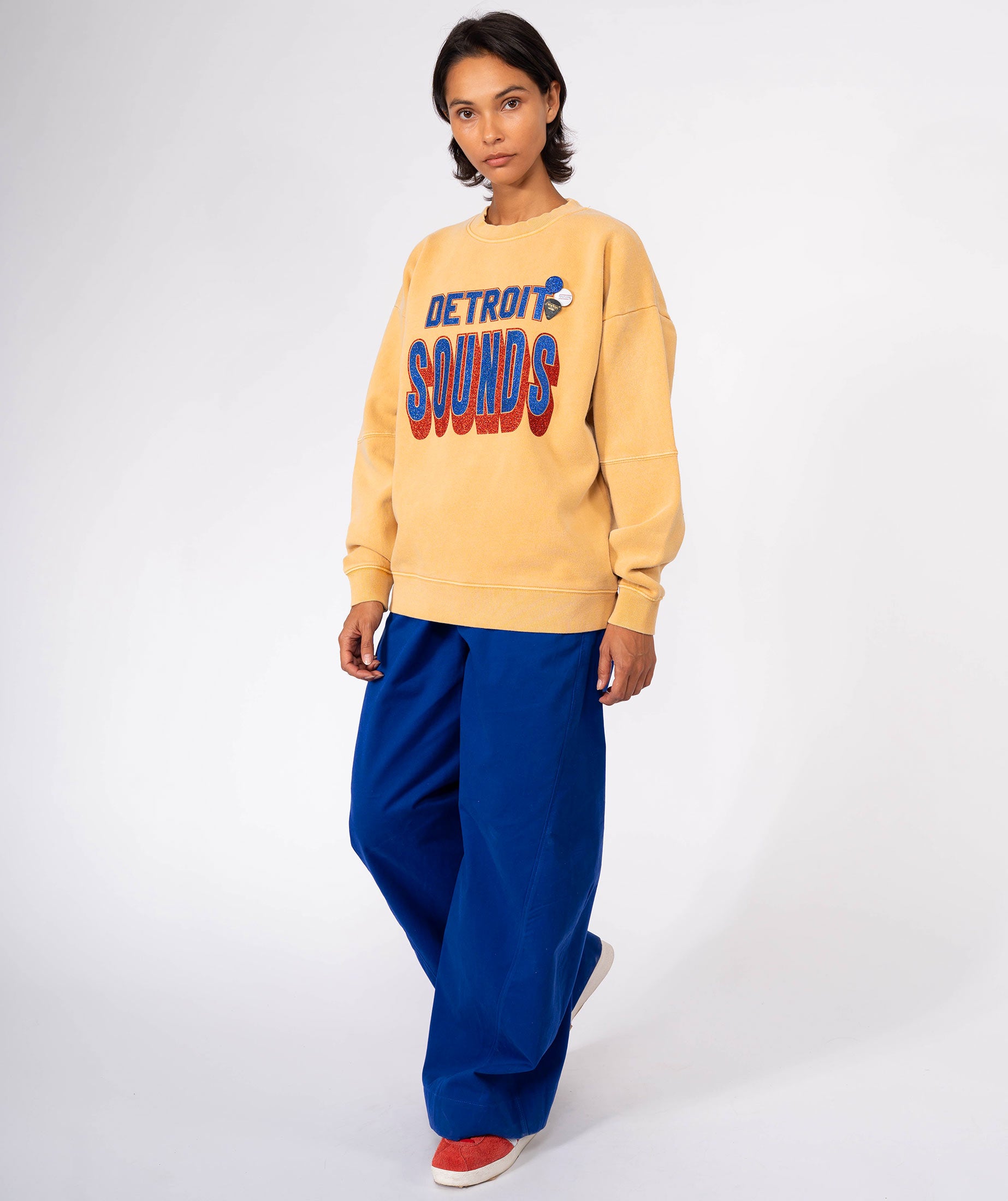 SONG" roller mustard sweatshirt