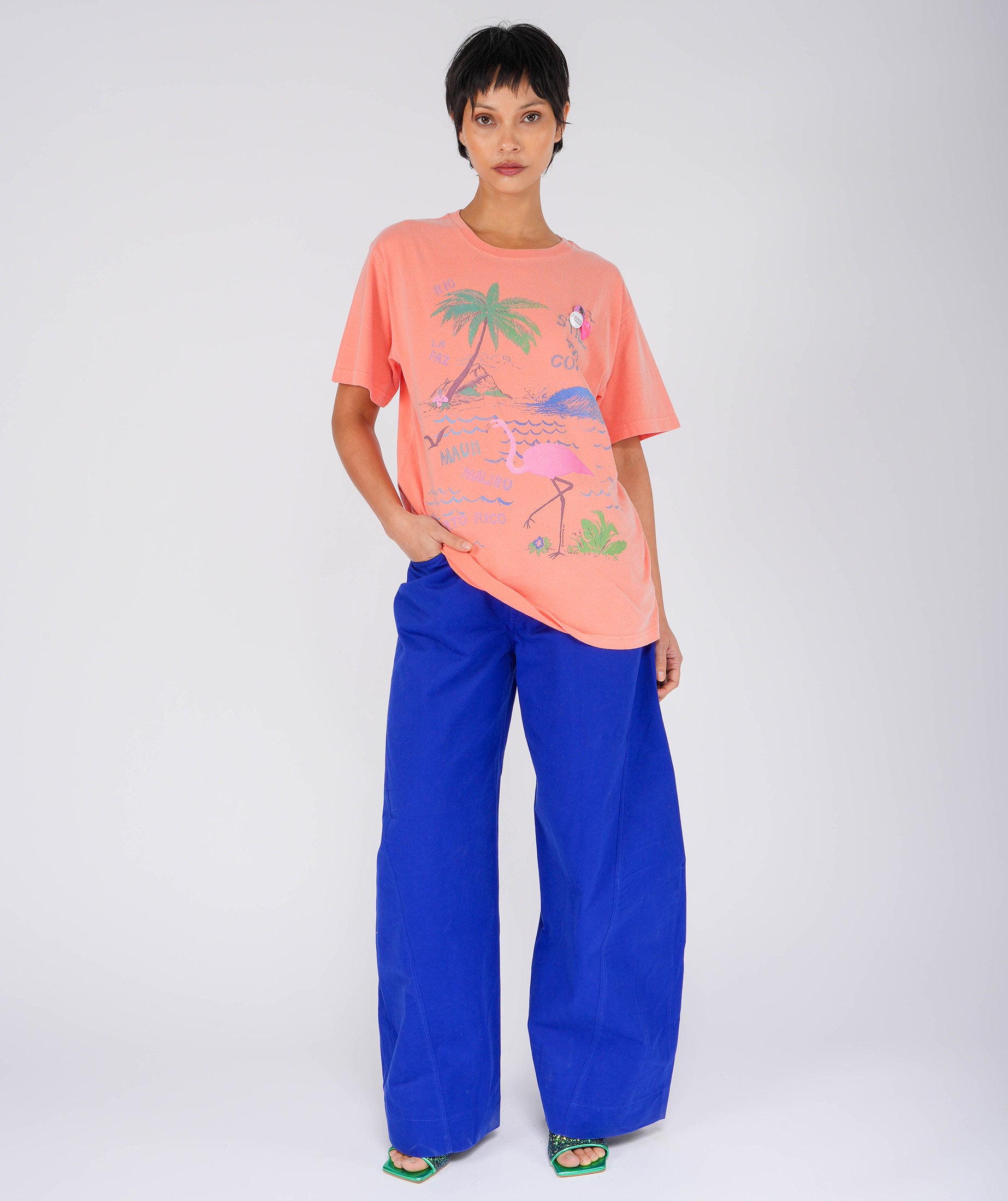 FLAMINGO" coral trucker tee shirt