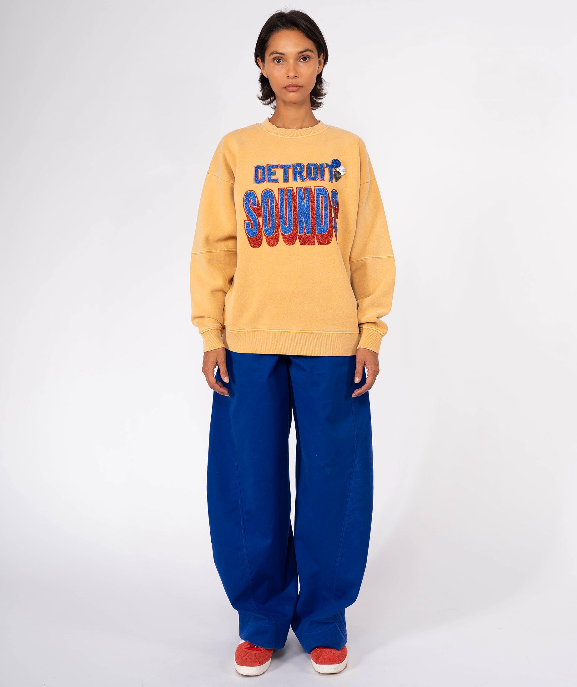 SONG" roller mustard sweatshirt