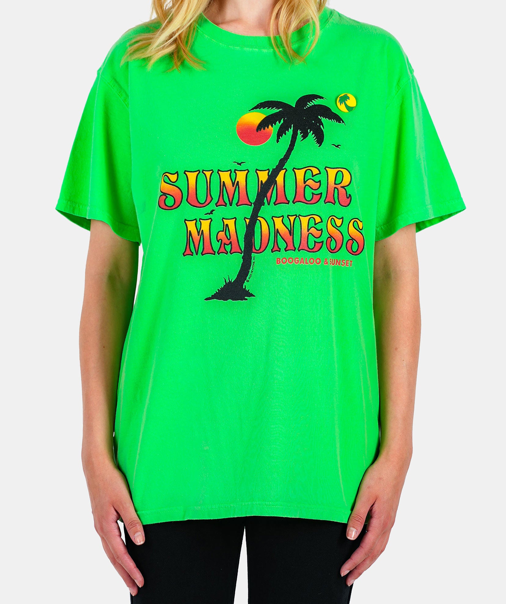 Neon green "MADNESS" trucker tee