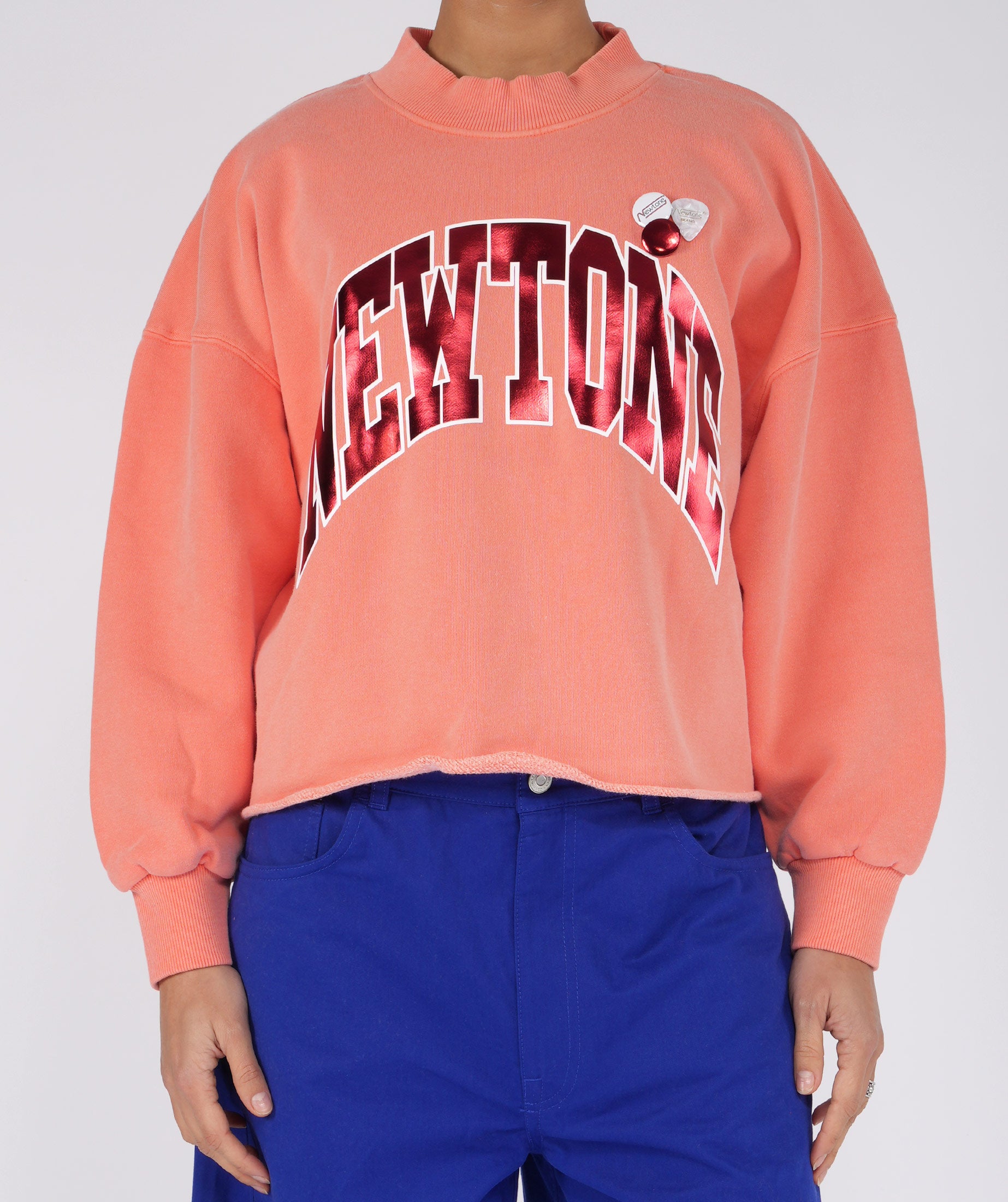 TONE SS25" coral crop sweatshirt