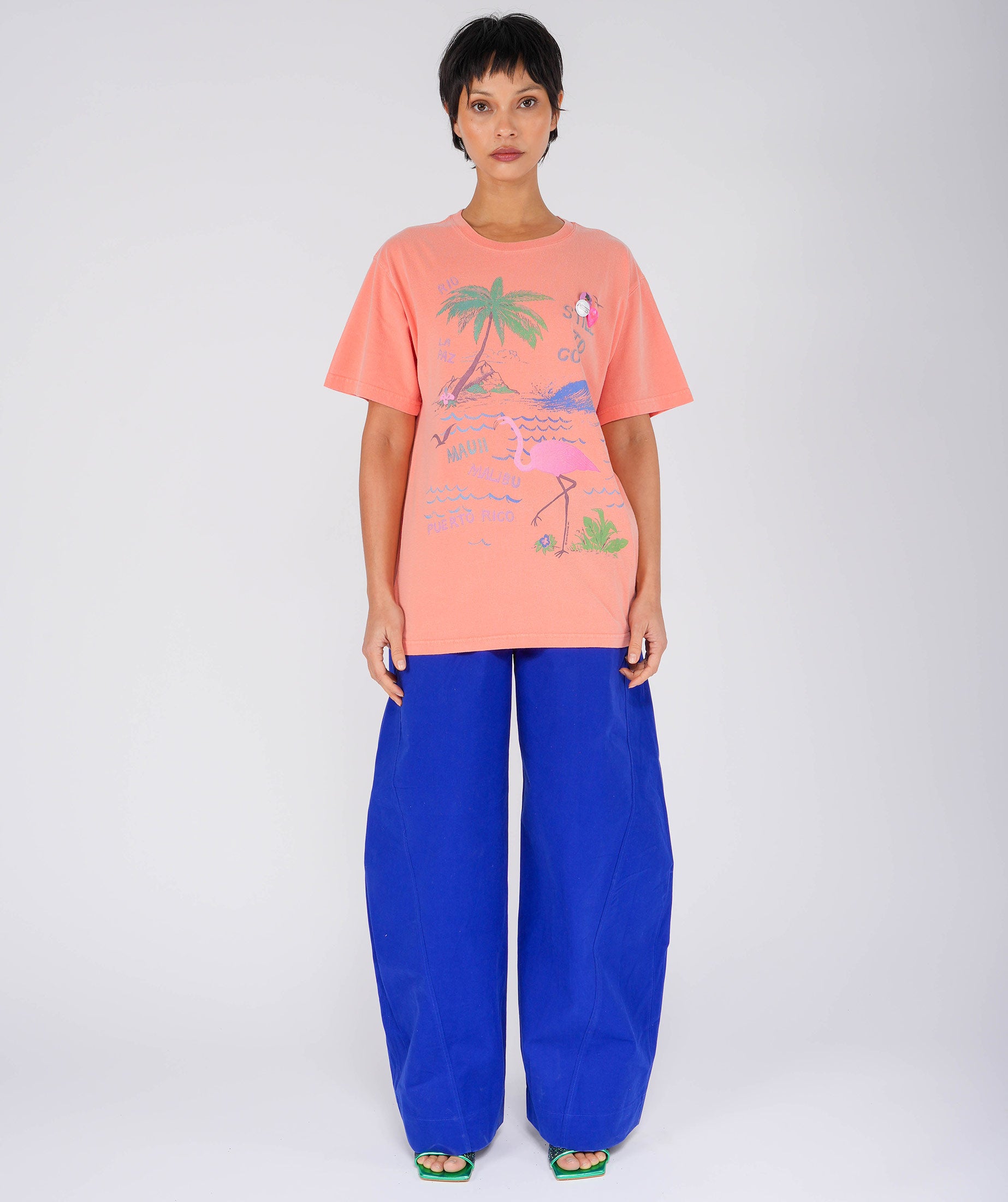 FLAMINGO" coral trucker tee shirt